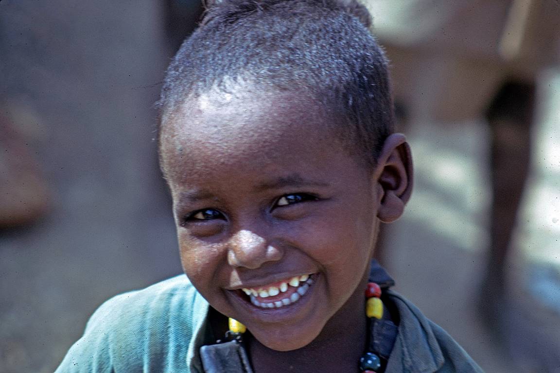 A close-up of a young child smiling

Description automatically generated