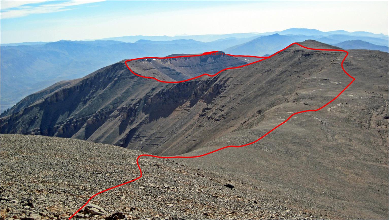 A red line on a mountain

Description automatically generated