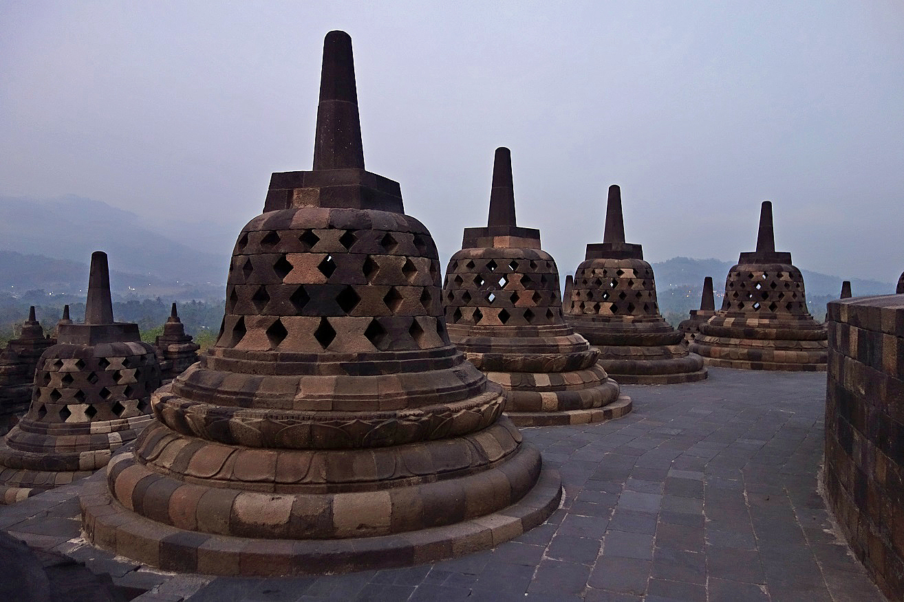 A group of stone pagodas

Description automatically generated