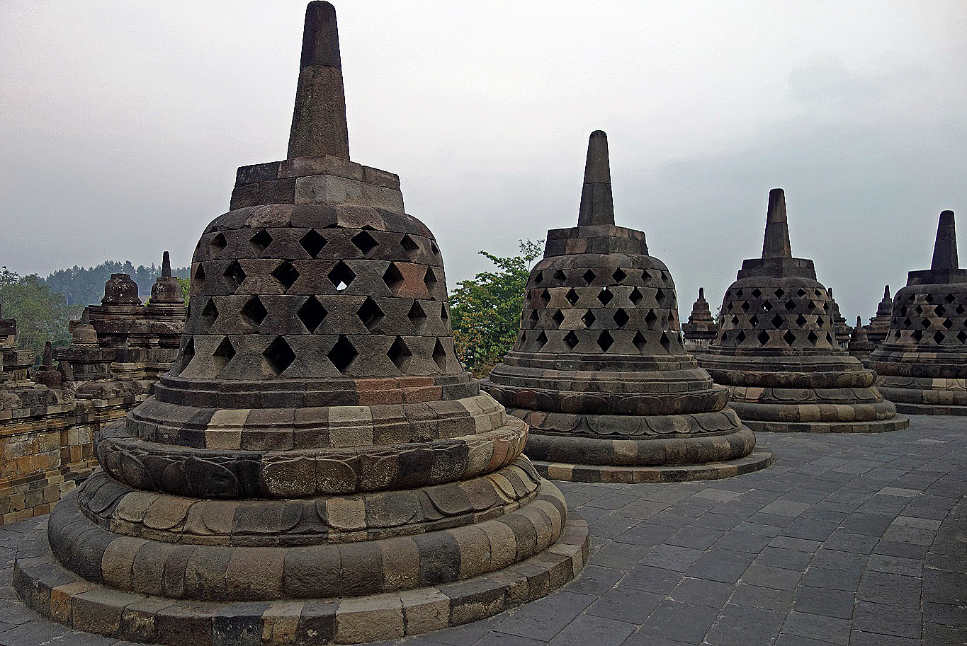 A group of stone pagodas

Description automatically generated