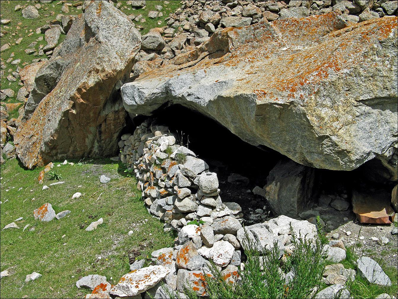 A cave in a rocky hillside

Description automatically generated with medium confidence