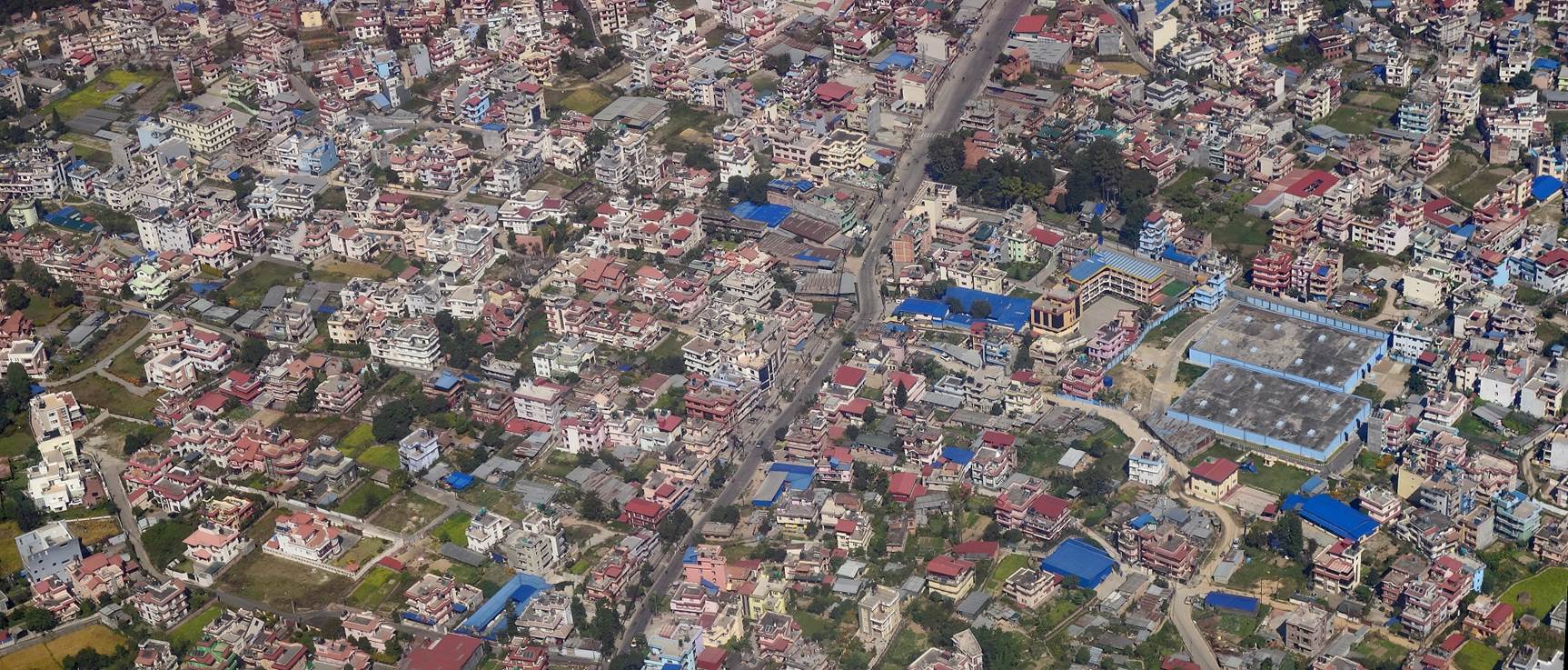 An aerial view of a city

Description automatically generated