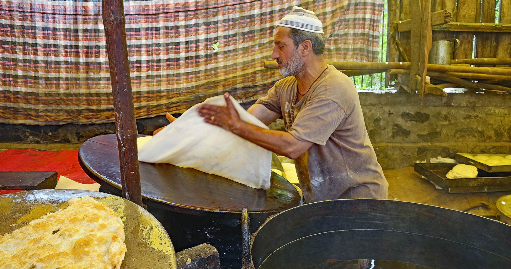 A person painting outside

Description automatically generated with low confidence